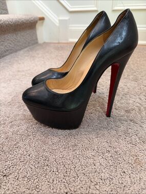 Christian Louboutin Black Leather Platform Pumps with Signature Red Sole